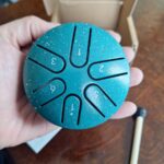 Ethereal Drum, A 3-inch 6-tones Steel Tongue Drum, Is Compact And Portable, Allowing People To Relieve Stress, Heal And Meditate. It Comes With Drumsticks And Music Notes. Eid Al-Adha Mubarak photo review